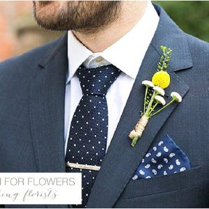 iscoyd park yellow buttonholes wedding flowers