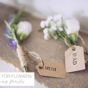 Cripps Barn Wedding Flowers Buttonholes tied with twine and luggage tags