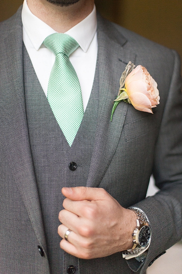 peach buttonhole mint green tie groom