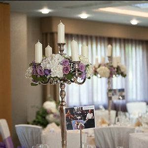 purple wedding flowers Mallory Court tall centrepieces candelabra Passion for Flowers Florists