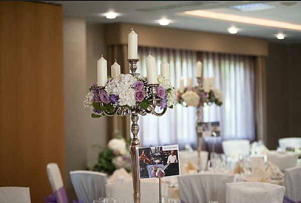 purple wedding flowers Mallory Court tall centrepieces candelabra Passion for Flowers Florists