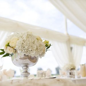 white rose hydrangeas footed vases top table wedding flowers
