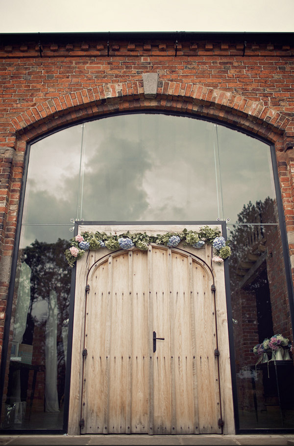 flower arch outside shustoke farm barns wedding flowers passion for flowers