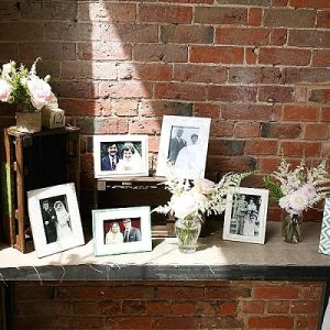 shustoke farm barns wedding flowers passion for flowers photo table at wedding