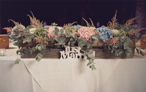 wooden crate box with flowers top table shustoke farm barns summer wedding florist passion for flowers