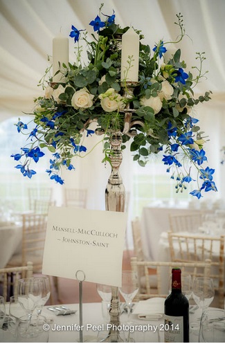 Candelabra wedding centrepieces at Sandon Hall with blue and white flowers by Passion for Flowers (1)