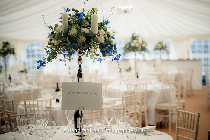 Candelabra wedding centrepieces at Sandon Hall with blue and white flowers by Passion for Flowers (2)