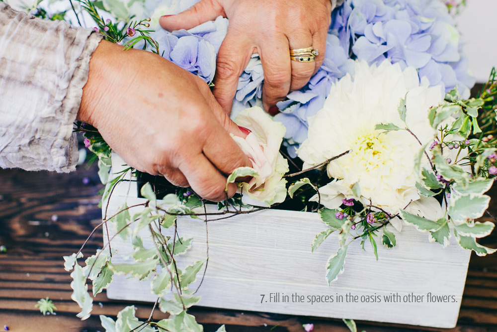 step by step guide how to make a floral wedding centrepiece for rustic weddings using a wooden crate by Passion for Flowers