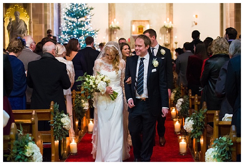 wedding-church-flowers-white-and-green-pew-ends