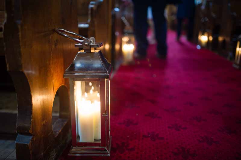 Silver lanterns down the aisle Hampton Church Wedding Flowers Passion for Flowers