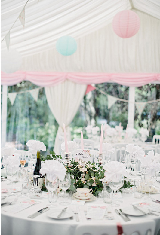 Foliage and Blush Pink Roses arounf base of fmaily candelabra Wedding in Marquee in Family Home Knowle Solihull (2)