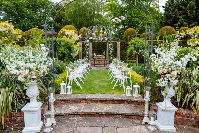 Outdoor-wedding-ceremony-flowers-at-Birtsmorton-Court-for-intimate-ceremony-in-the-White-Garden.-Flowers-by-Passion-for-Flowers