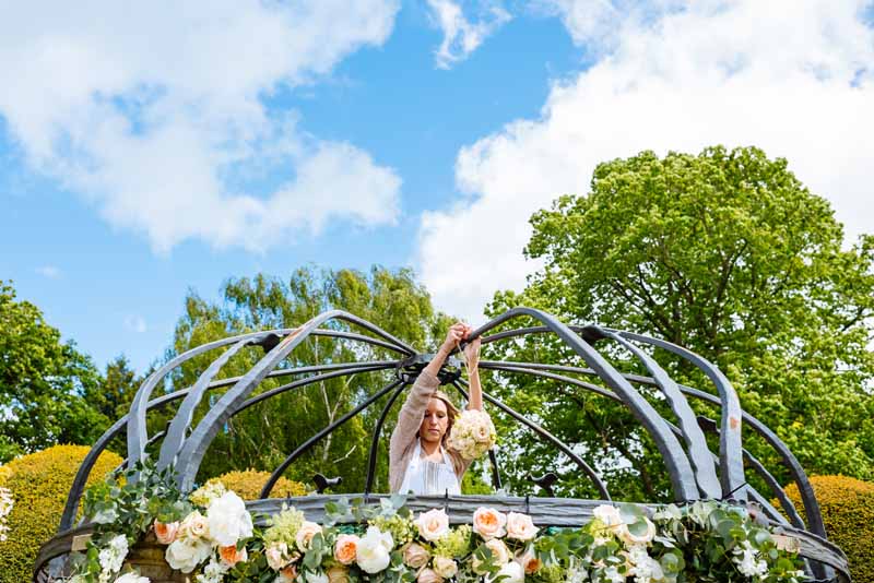 Passion-for-Flowers-behind-the-scenes-hanging-flowers-for-outdoor-wedding-ceremony