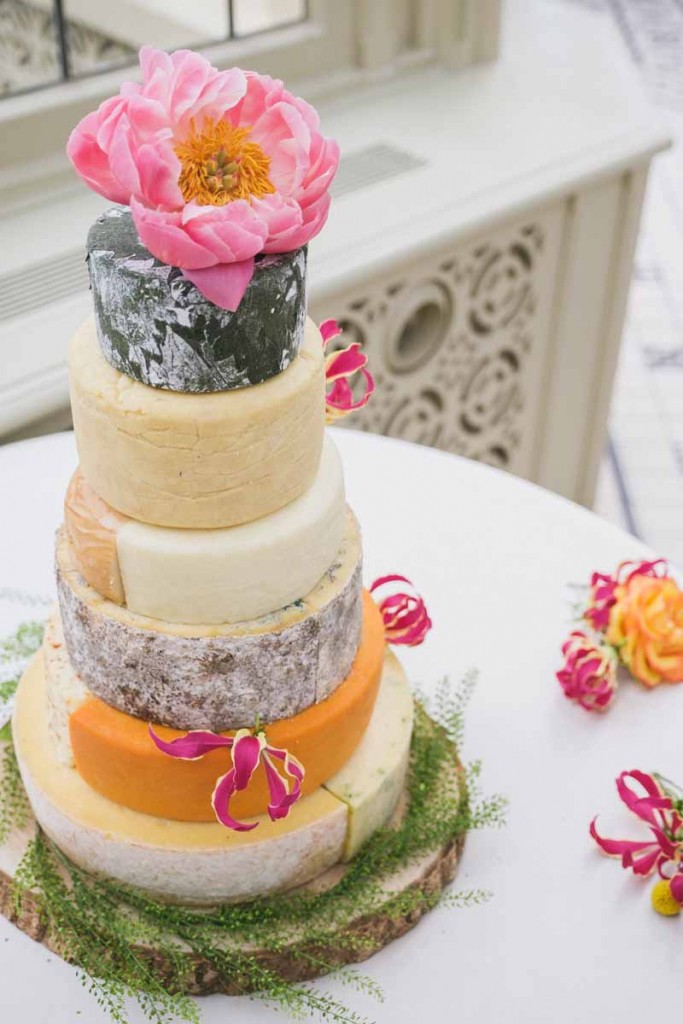 coral peonies on wedding cheese cake