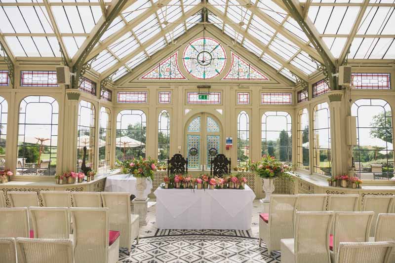 wedding ceremony flowers Kilworth House luxe wedding urns and statement flowers in Orangery (3)