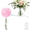 large round balloon with foliage trail for weddings pink white wedding bouquet featured in wedding flowers magazein by passion for flowers