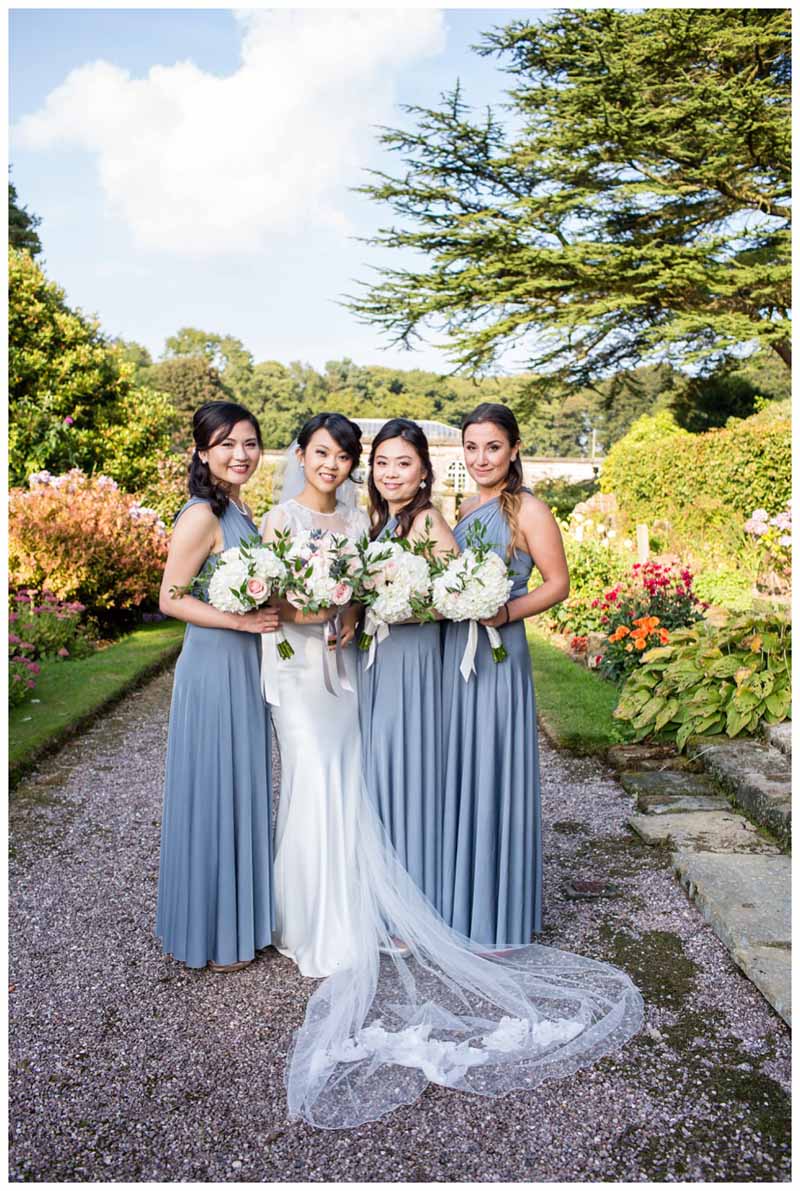Bridesmaids flowers - bouquets with long grey blue bridesmaid dressed. Flowers by @kmorganflowers Passion for Flowers