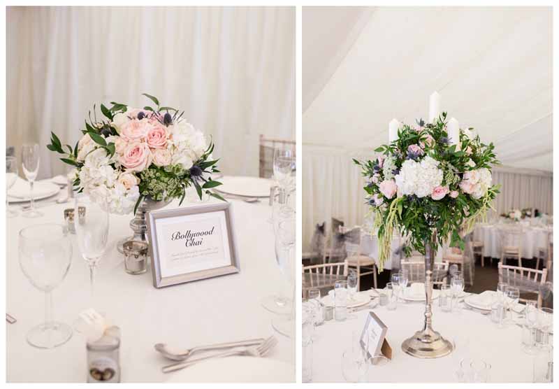 Tall and low wedding centrepieces elegant silver candelabra and silver foted bowl. Wedding flowers by @kmorganflowers