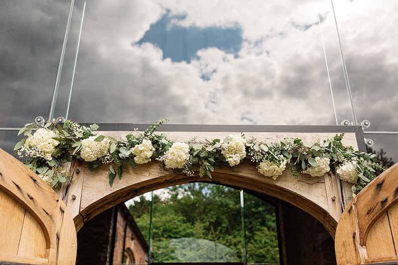 Flower arches at Shustoke Farm Barns