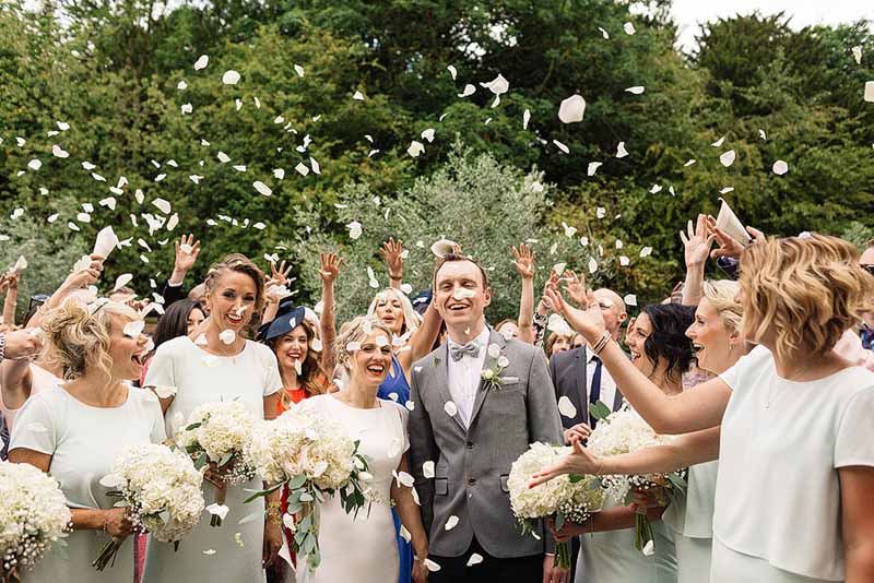 The-perfect-confetti-shot-at-Shustoke-Farm-Barns-Wedding-Florist-Passion-for-Flowers-@kmorganflowers