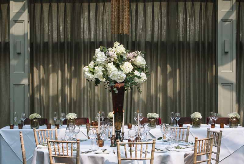 Tall wedding centrepiece bronze vases with classic white flowers at Hampton Manor Wedding - flowers by Passion for Flowers @kmorganflowers 