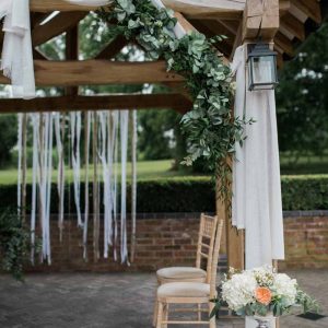 Outdoor wedding ceremony styling flowers and drapes at Wethele Manor by Passion for Flowers @kmorganflowers