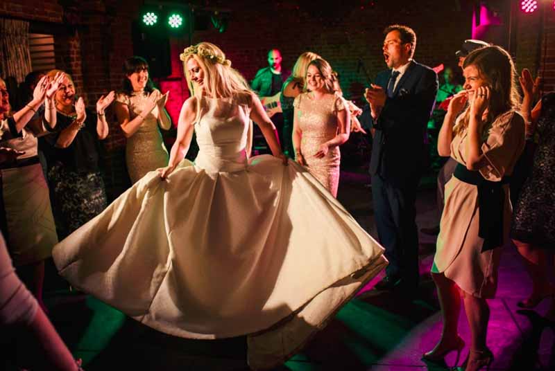 bride dancing in flower crown