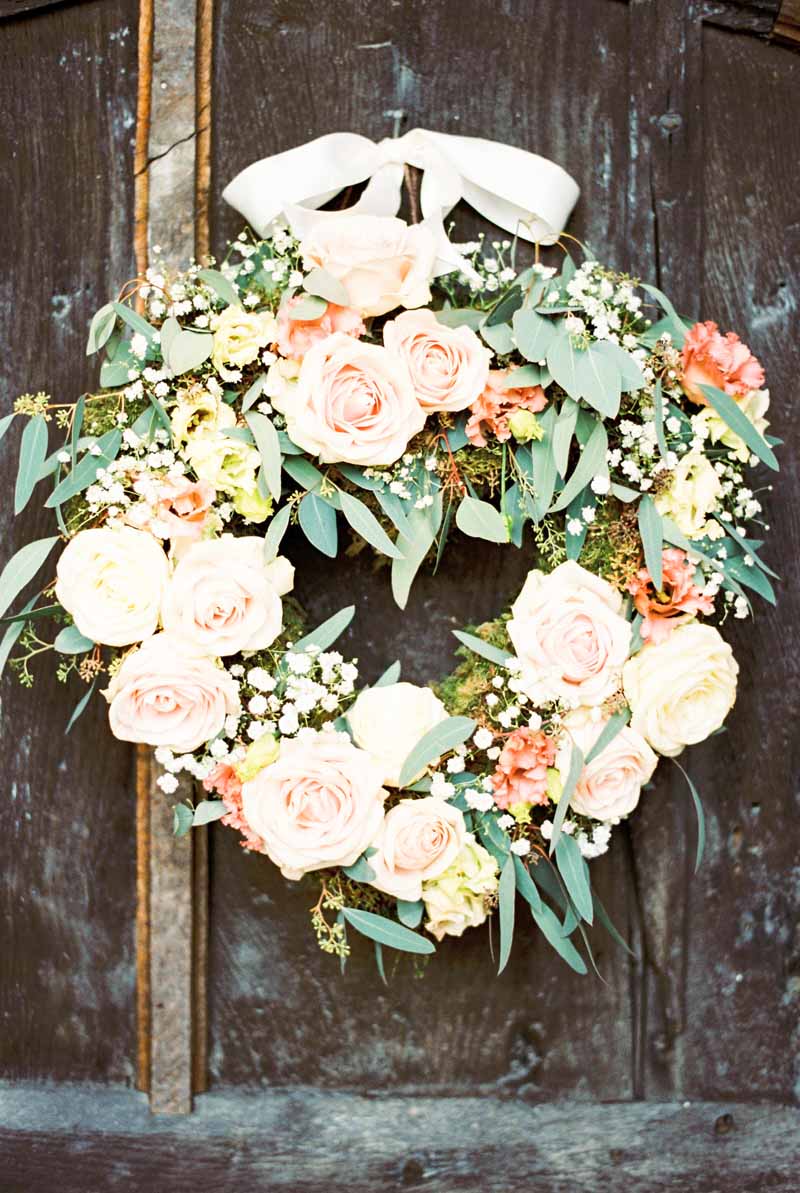 round door wreath for wedding entrance peach and grey wedding flowers by passion for flowers @kmorganflowers