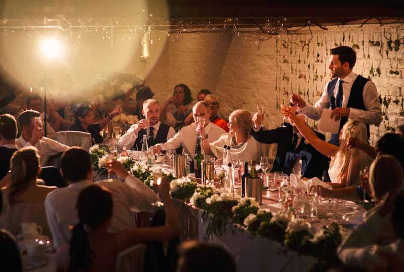 top table wedding flowers long garland with flower wall backdrop at curradine barns by passion for flowers wedding florist