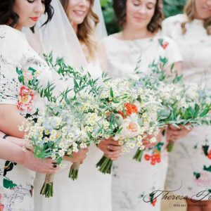 Bright brideamids bouquets with floral bridesmaids dresses orange yellow and green by Passion for Flowers @kmorganflowers