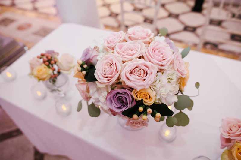 blush-pink-and-purple-roses-for-wedding-ceremony-table-compton-verney-by-passion-for-flowers