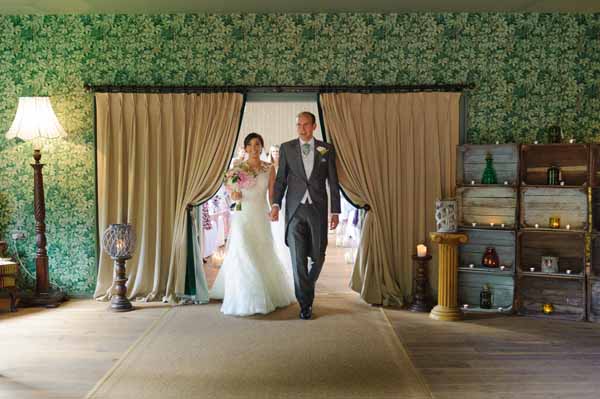 barn-wedding-ceremony-with-curtains-hampton-manor