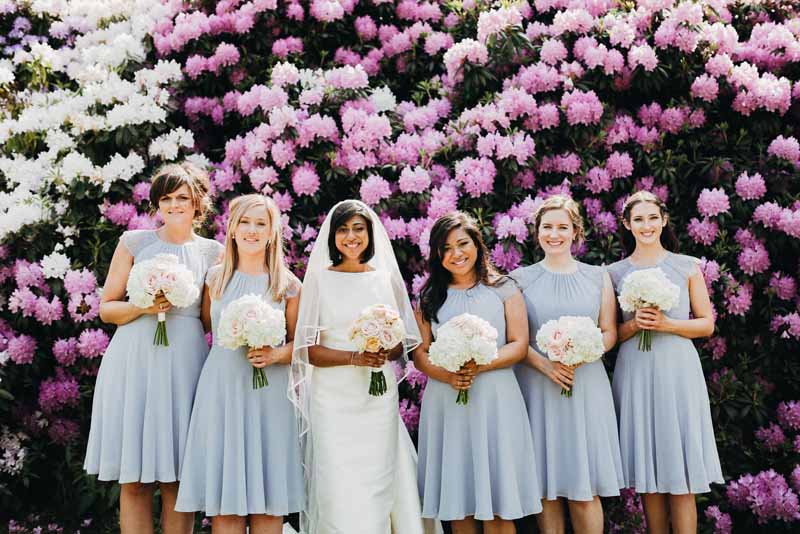 bridesmaids-dresses-pale-blue-with-blush-pink-peach-bouquets