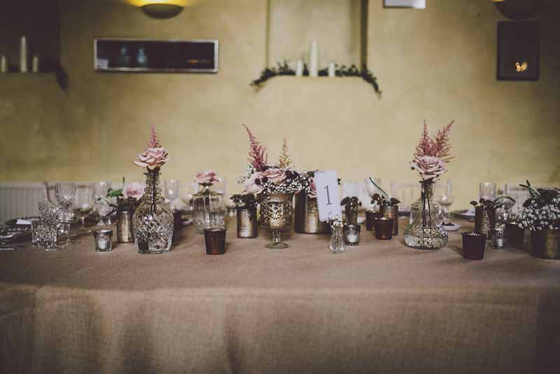 crystal-glass-vases-and-silver-wedding-centrepieces-at-sudeley-castle-by-passion-for-flowers-1