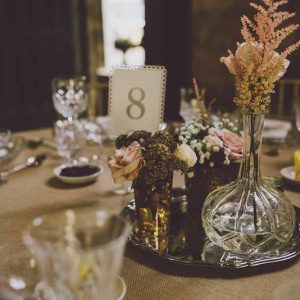 crystal-glass-vases-and-silver-wedding-centrepieces-at-sudeley-castle-by-passion-for-flowers-3