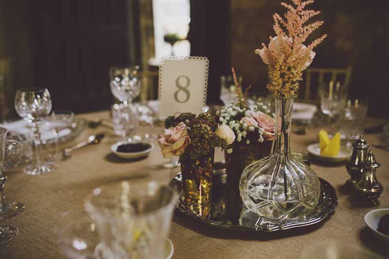 crystal-glass-vases-and-silver-wedding-centrepieces-at-sudeley-castle-by-passion-for-flowers-3