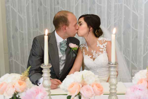 flowers-for-register-table-wedding-ceremony-peach-pink-roses