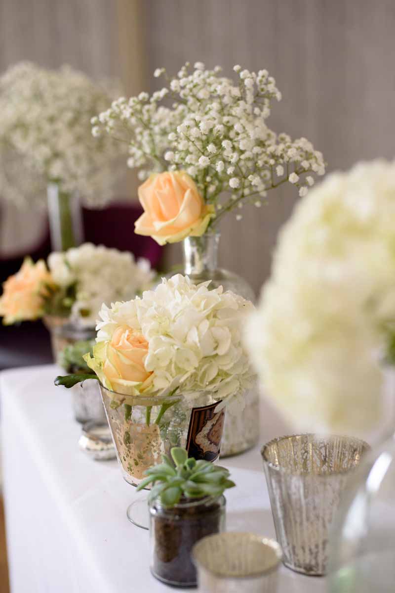 glass-vases-for-wedding-ceremony-tables-white-and-peach-flowers-by-passion-for-flowers-2