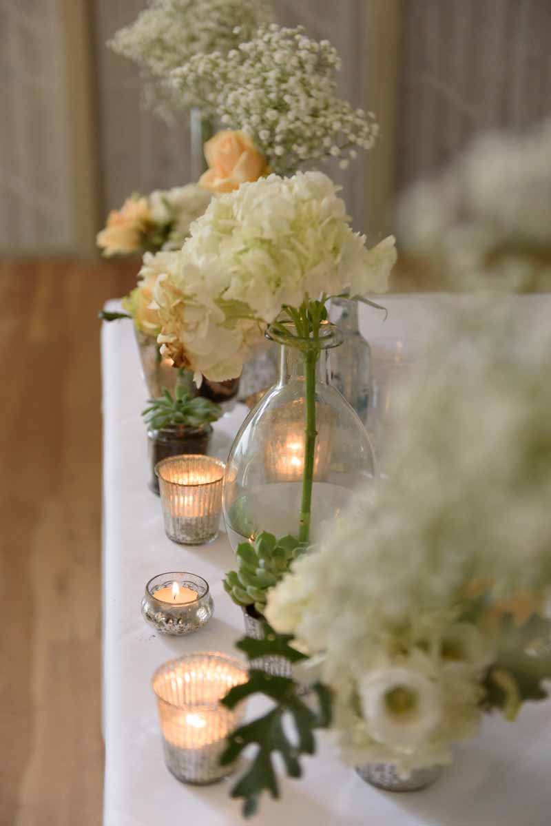 glass-vases-for-wedding-ceremony-tables-white-and-peach-flowers-by-passion-for-flowers-3