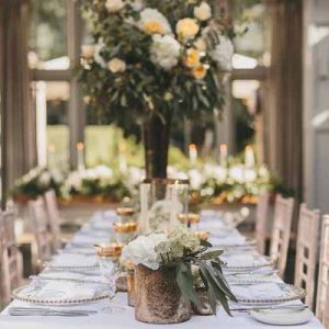 gold-bronze-wedding-vases-white-peach-flowers
