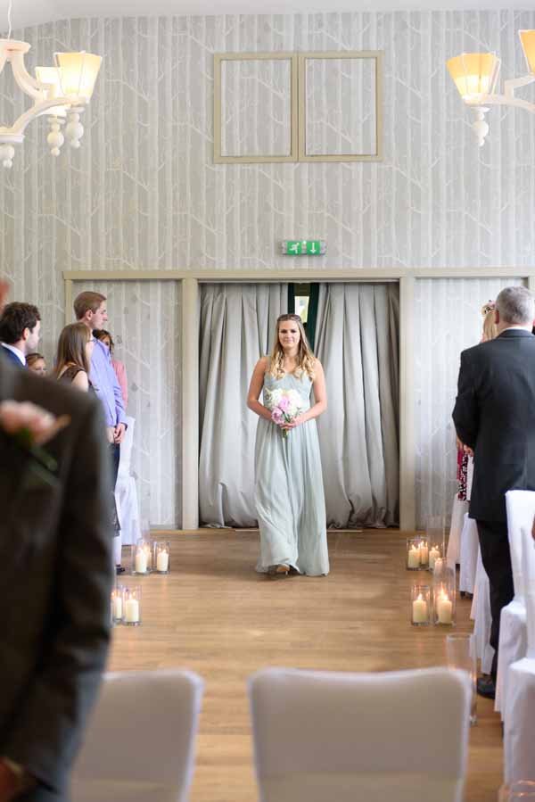 hampton-manor-wedding-ceremony-lanterns-down-aisle-2