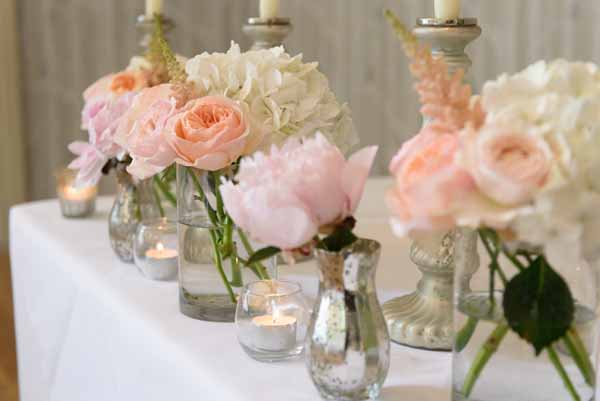 pink-peach-wedding-ceremony-table-flowers-in-glass-vases-and-mercury-silver-vases-hampton-manor