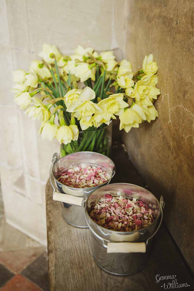 Pink-petal-confetti-at-church-in-silver-buckets-available-from-@theweddingomd