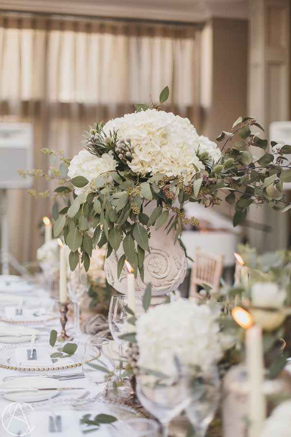 stone-urn-centrepieces-white-hydrangeas-winter-wedding-flowershampton-manor-wedding-florist-passion-for-flowers-20