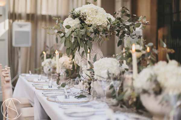 stone-urn-centrepieces-white-hydrangeas-winter-wedding-flowershampton-manor-wedding-florist-passion-for-flowers-21
