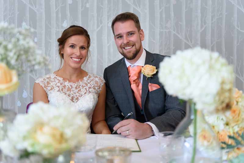 wedding-ceremony-tables-with-lots-of-flowers