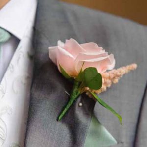 pink-sweet-avalanche-rose-button-holes-grey-suit