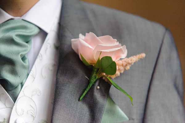 pink-sweet-avalanche-rose-button-holes-grey-suit