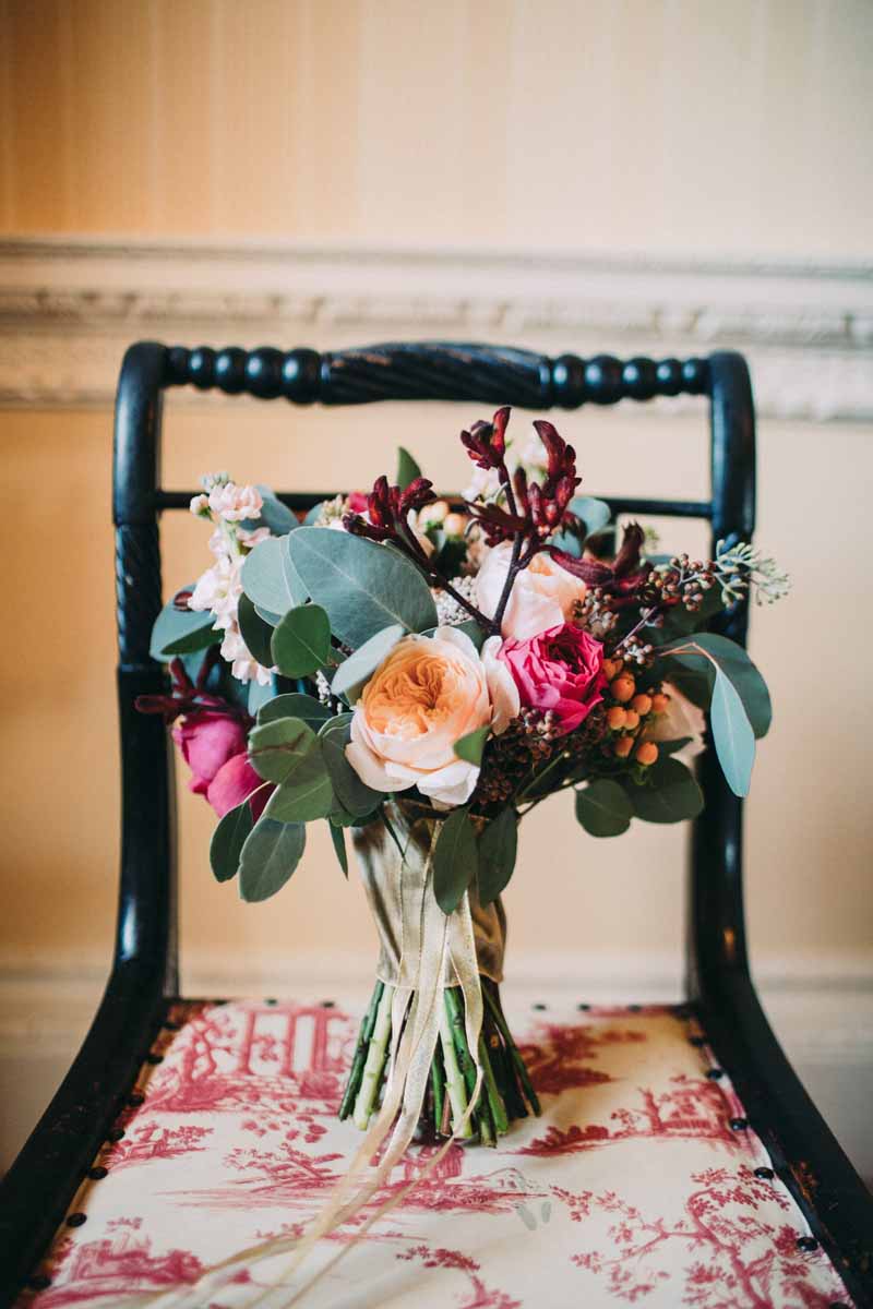 autumn-wedding-bouquet-free-form-deep-red-pink-and-peach-roses-with-foliage-by-passion-for-flowers-david-austin-roses