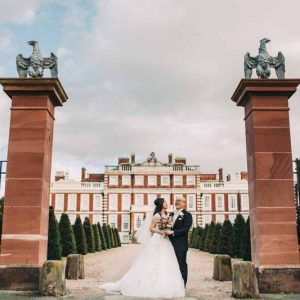 bride-and-groom-portraits-knowsley-hall-deep-pink-burgundy-wedding-bouquet-1
